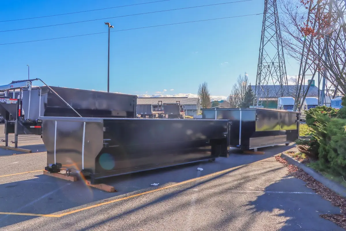 Roll-off dumpster ready for waste disposal at job site for Construction Dumpster Rental in East Earl